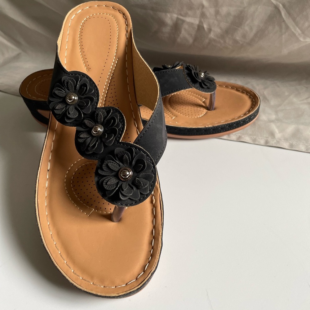 Sundance black flower flip flops